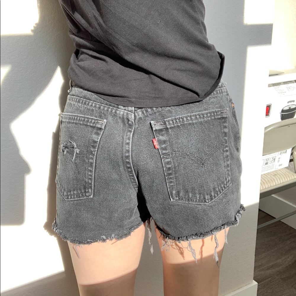 Vintage Levi’s Black wash cut off jean shorts